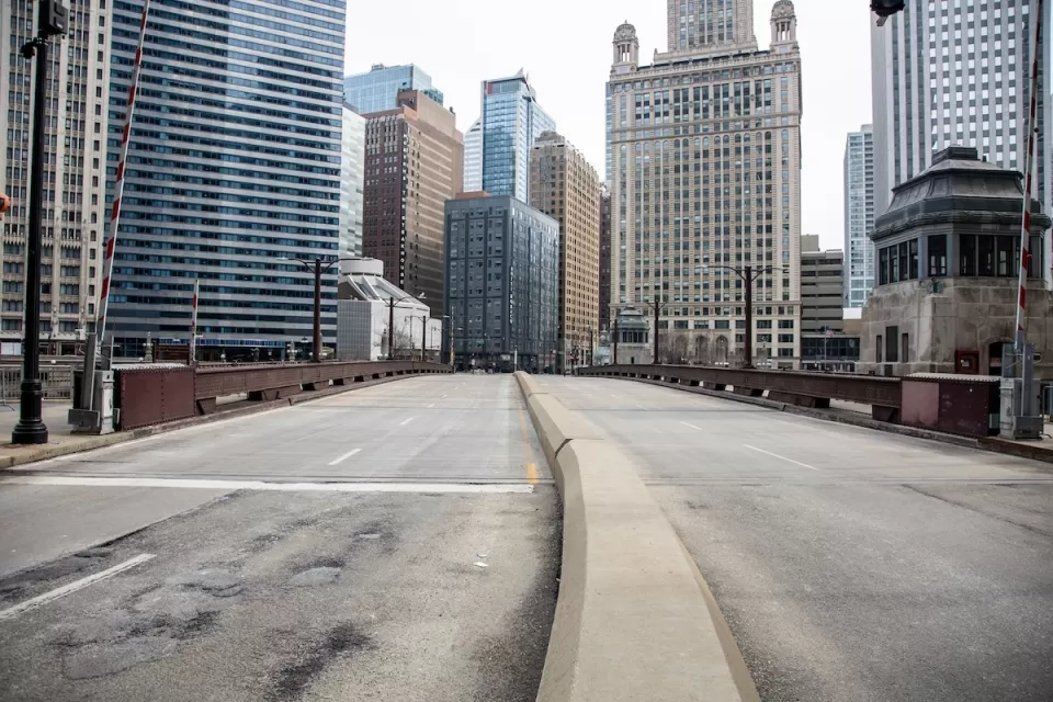 Empty street and high-rise buildings in downtown Chicago, Illinois during COvid-19 pandemic.